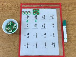build addition problems with mini erasers co.