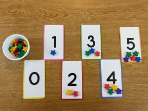 count and match numbers with mini erasers co.