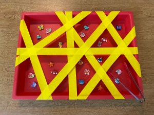 sensory bin search with mini erasers co.
